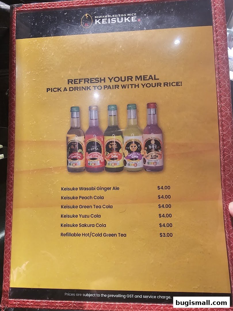A menu featuring various flavored colas and green tea from Scrambled Egg Rice Keisuke.