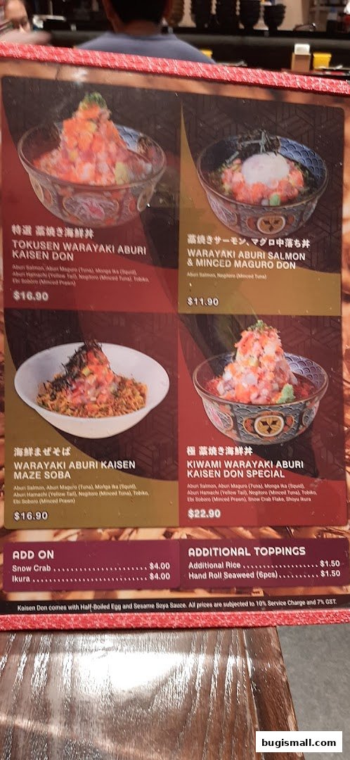 A menu board displaying various Kaisen Don and Maze Soba dishes with prices.