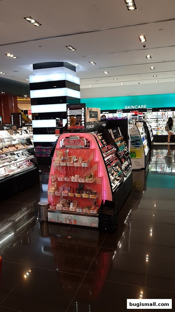 Interior view of a Sephora store showcasing makeup and skincare products with prominent displays.