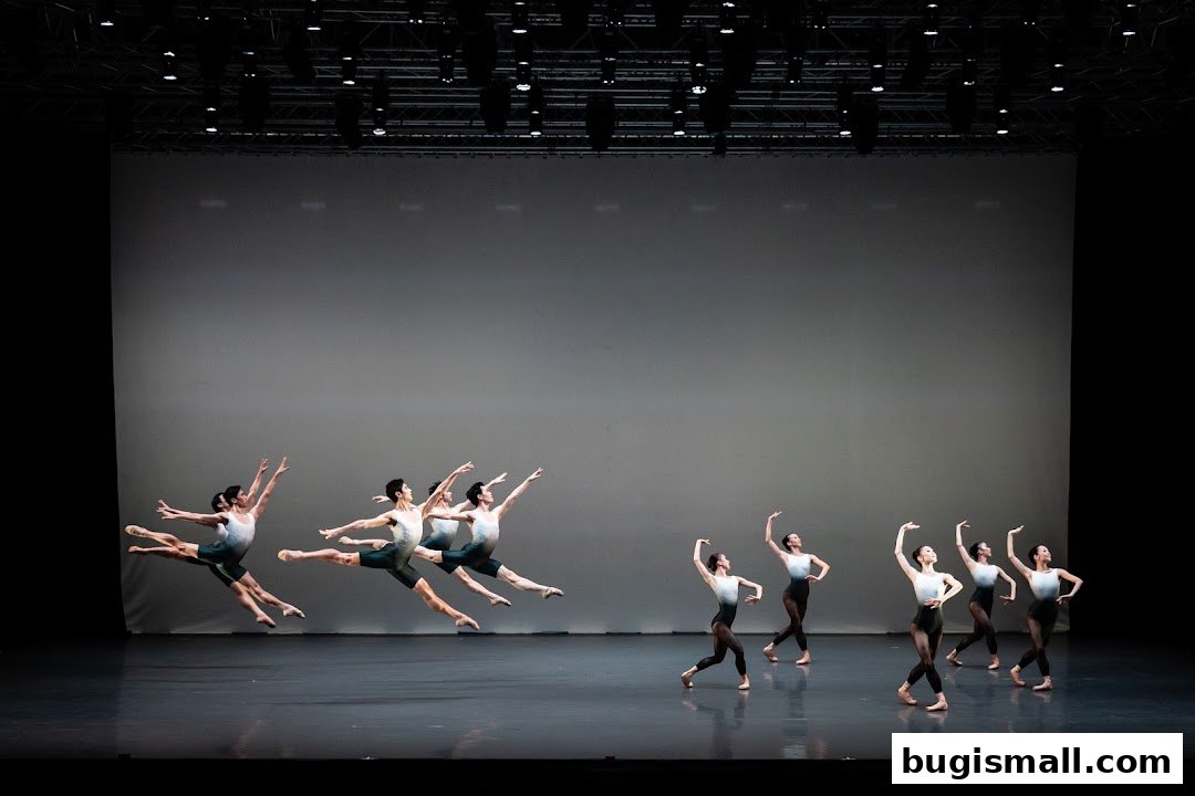 Ballet dancers in mid-air and on stage during a performance.