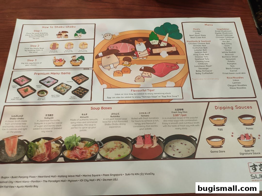 A menu for Suki-Ya showing shabu-shabu steps, premium items, soup bases, and dipping sauces.
