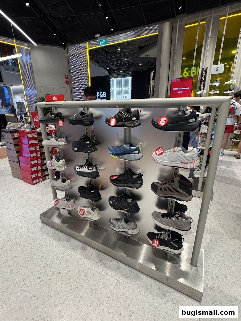 A display of various athletic shoes for sale in a retail store.