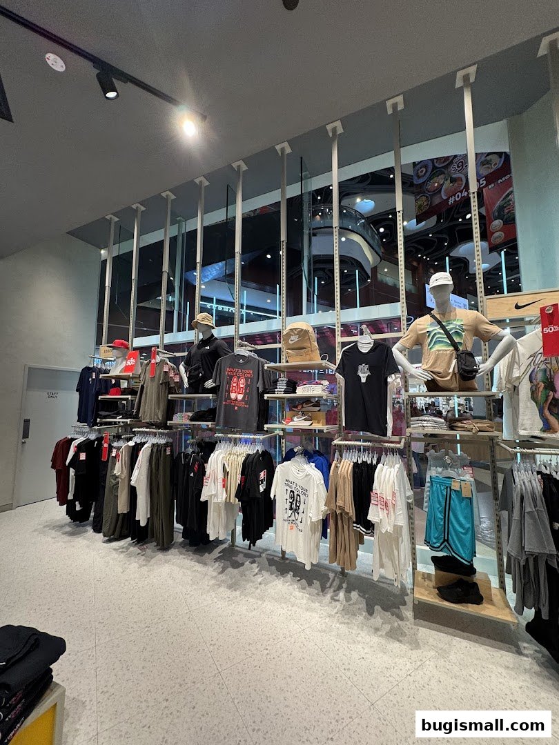 Interior view of a Sun Sand Sports store showcasing a variety of apparel and accessories.