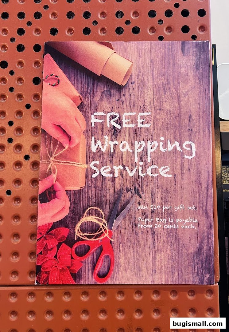 A sign advertising a free gift wrapping service with a minimum purchase.