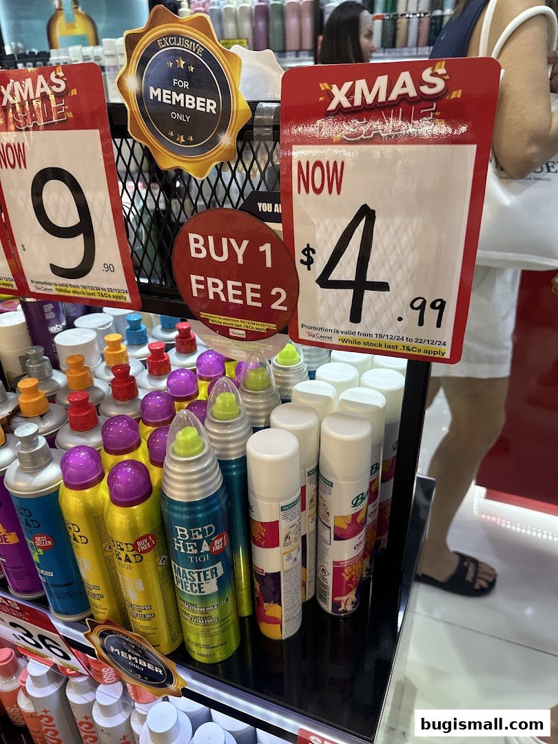A retail display featuring hair products with prominent Christmas sale signs and promotions.