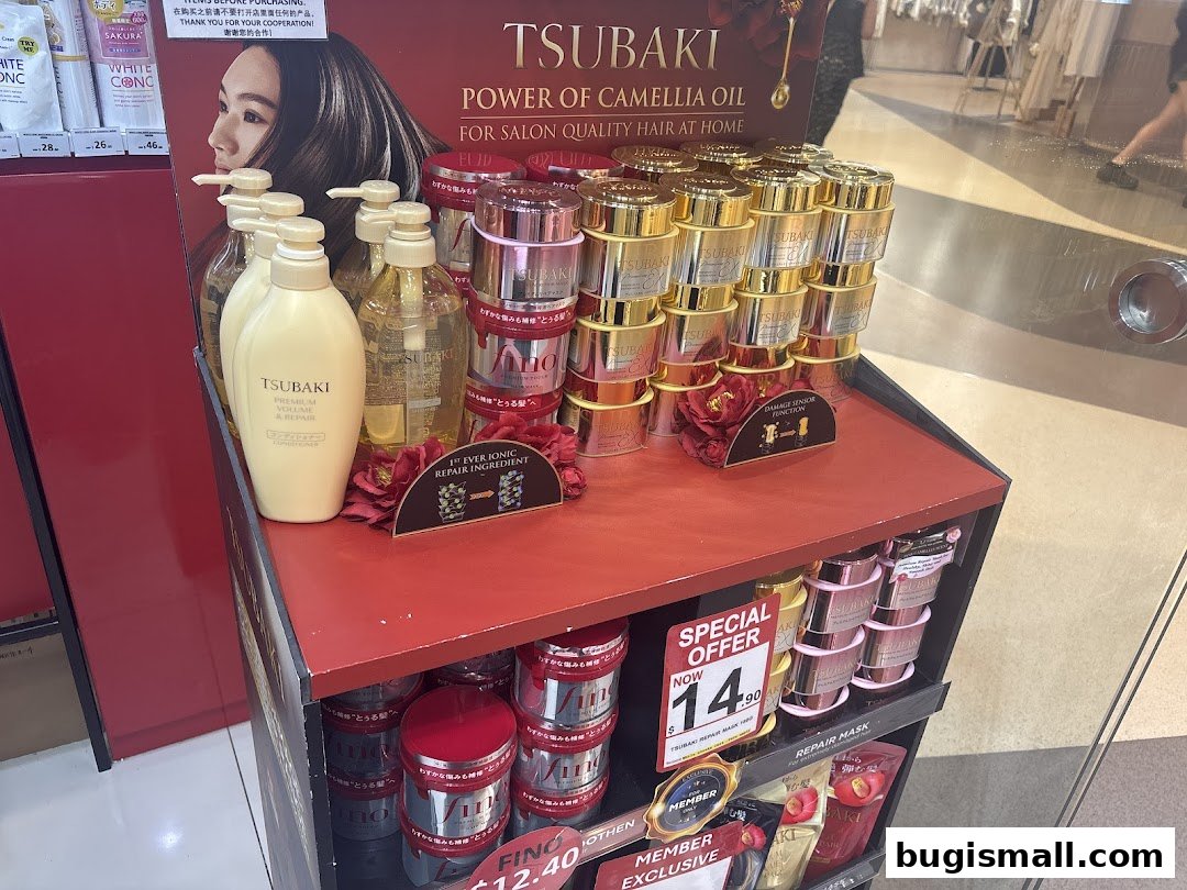 Display of Tsubaki hair care products, featuring camellia oil for salon-quality hair at home.