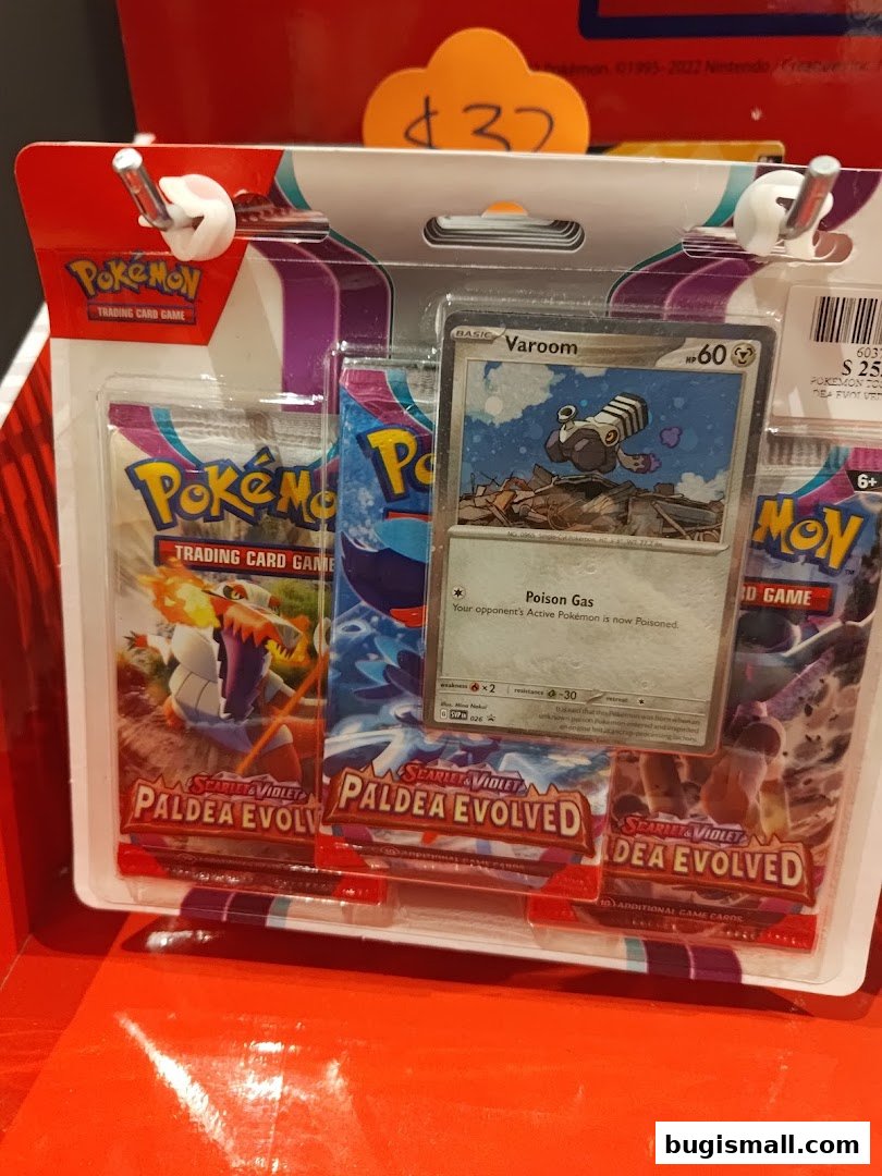 A display of Pokémon trading card packs, featuring the Scarlet & Violet Paldea Evolved set.