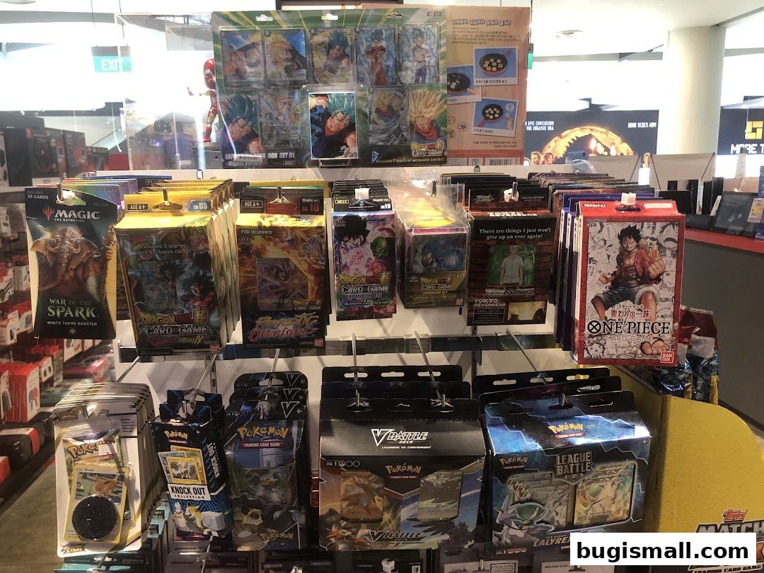 Display of various trading card games including Magic, Dragon Ball, One Piece, and Pokemon.