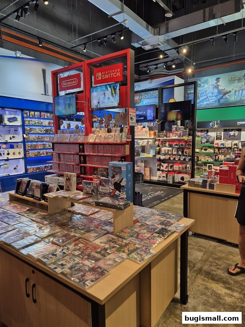 Interior of a brightly lit game store showcasing Nintendo Switch games and consoles.