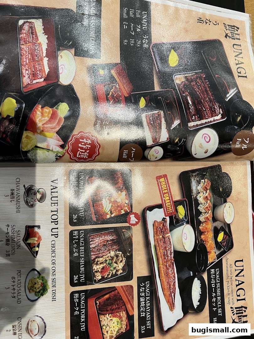 A menu featuring various eel dishes, sushi rolls, and side dishes with prices.