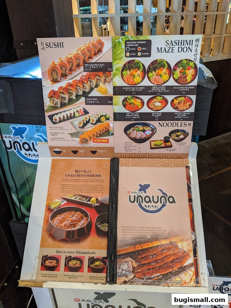 A menu display featuring sushi, poke bowls, sashimi maze don, and unagi hitsumabushi.
