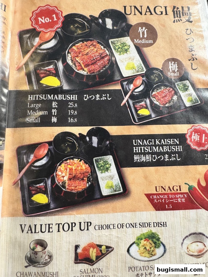 A menu featuring Unagi dishes, including Hitsumabushi and Unagi Kaisen Hitsumabushi, with various side dish options.