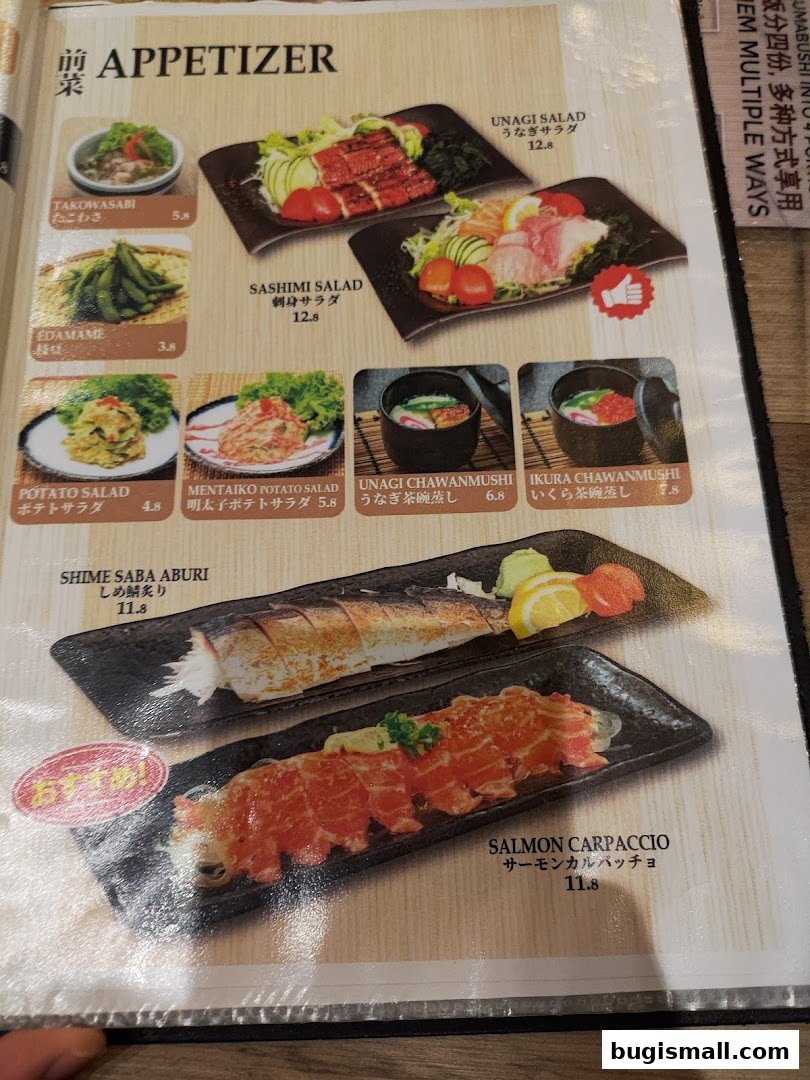 A menu page from Una Una featuring various Japanese appetizers like sashimi salad and salmon carpaccio.