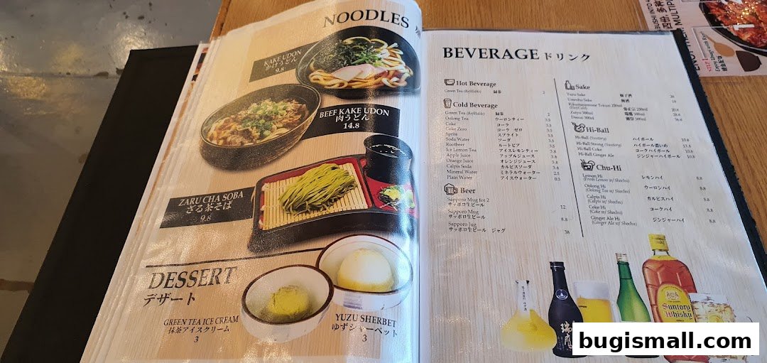 A menu featuring Japanese noodles, desserts, and beverages with prices.