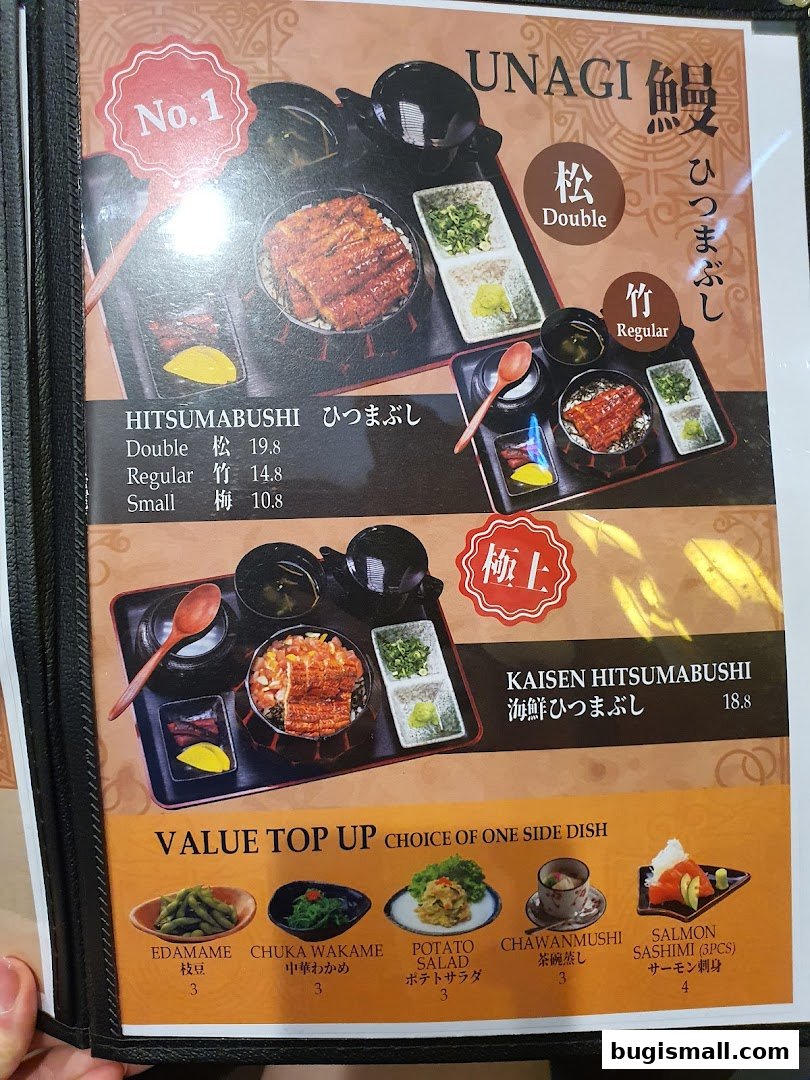 A menu featuring Unagi dishes, including Hitsumabushi and Kaisen Hitsumabushi, with side dish options.