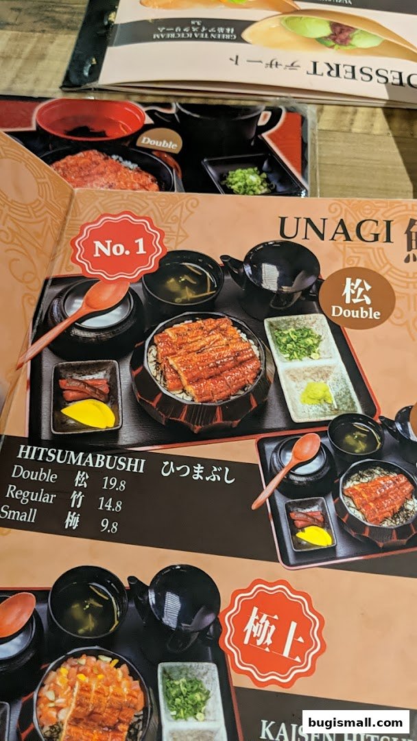 A menu featuring Unagi dishes, including Hitsumabushi in various sizes and options.