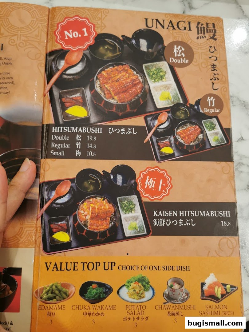 A menu featuring Unagi and Kaisen Hitsumabushi dishes with various side dish options.