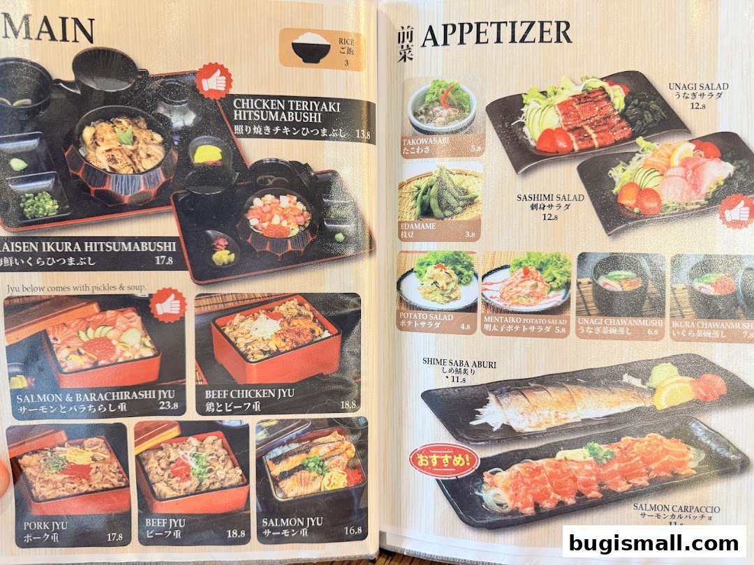 A menu featuring Japanese dishes, including main courses like Jyu bowls and appetizers such as salads and edamame.