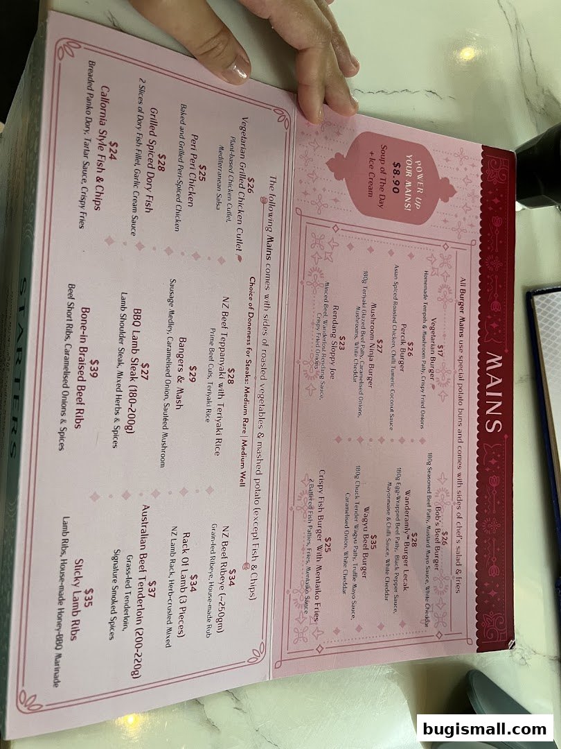 A menu from Wanderlost Lounge by The Halal Mixologist, featuring mains and starters.