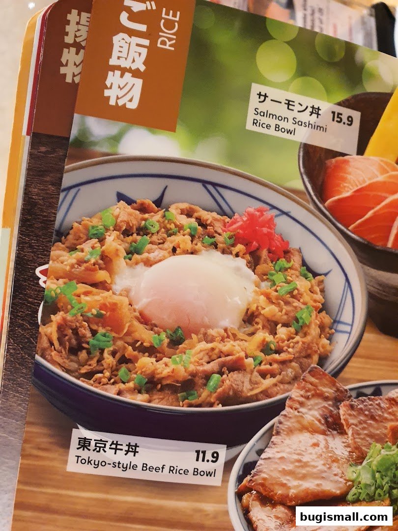 A menu featuring Japanese rice bowls, including salmon sashimi and beef.