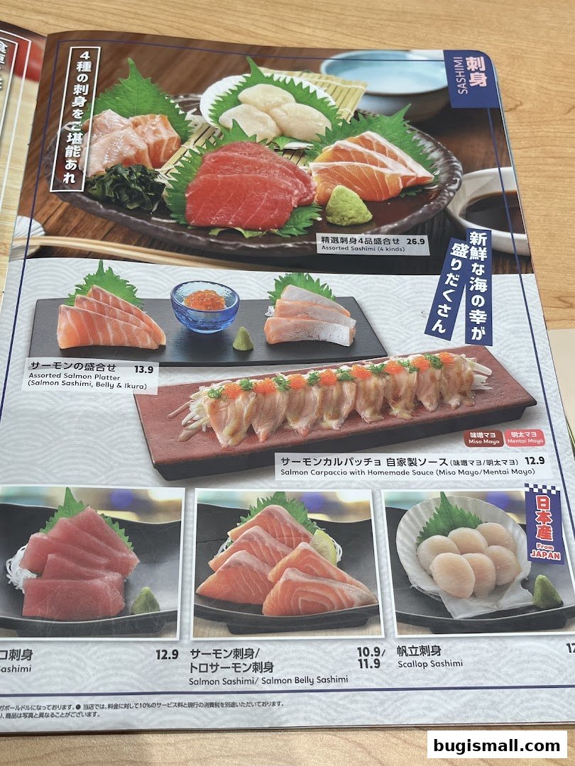 A menu featuring various sashimi dishes, including salmon and scallop options.