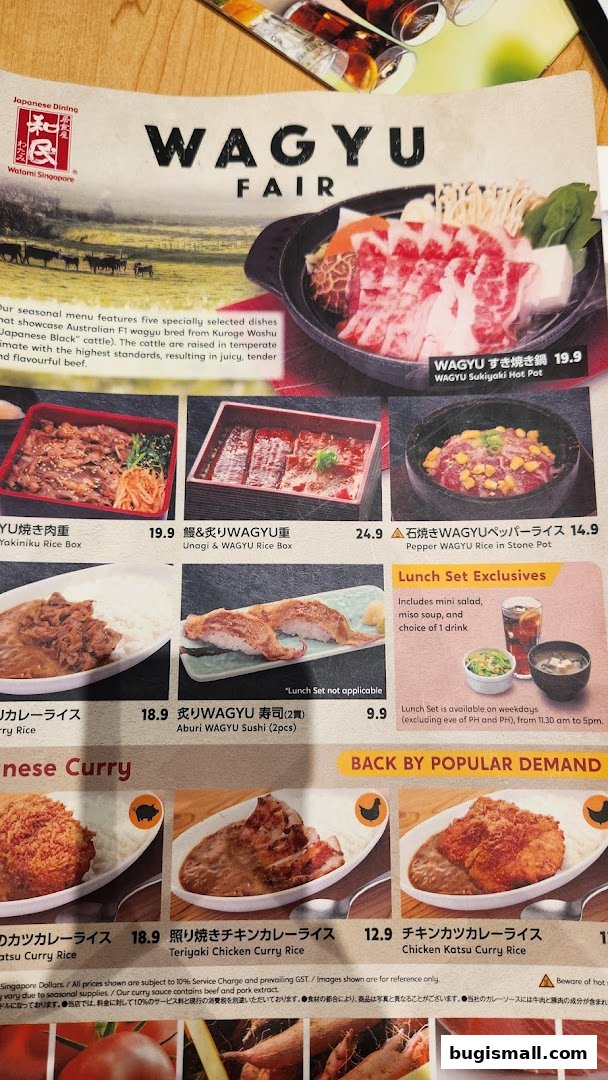 A menu from Watami Japanese Dining featuring Wagyu dishes and curry rice.