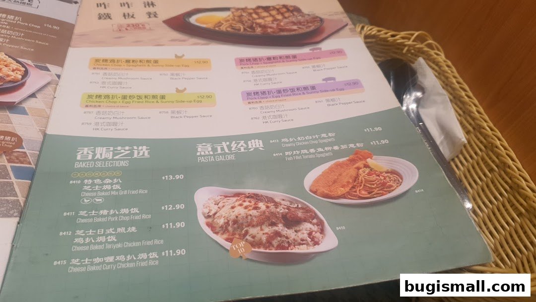 A menu from Xin Wang Hong Kong Café featuring baked selections and pasta dishes.