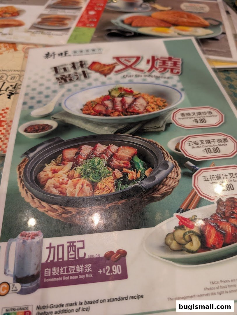 A menu from Xin Wang Hong Kong Cafe featuring Char Siu dishes and a homemade red bean soy milk.
