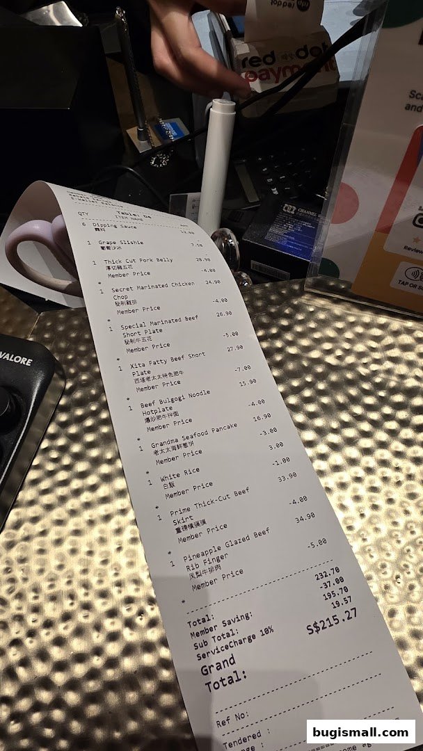 A receipt from Xita Lao Tai Tai Singapore showing various food items and their prices.