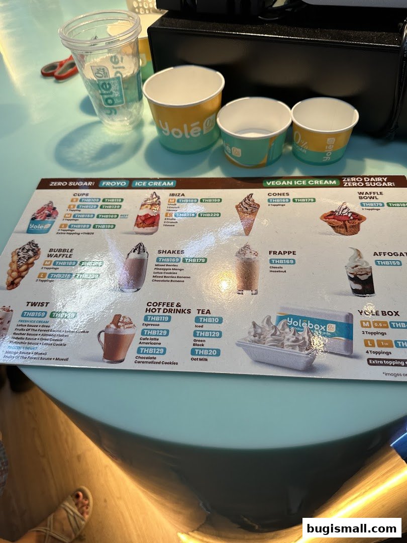 A menu from Yolé Bugis showcasing various frozen yogurt and ice cream options.